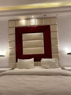 bed and tv cushion wall