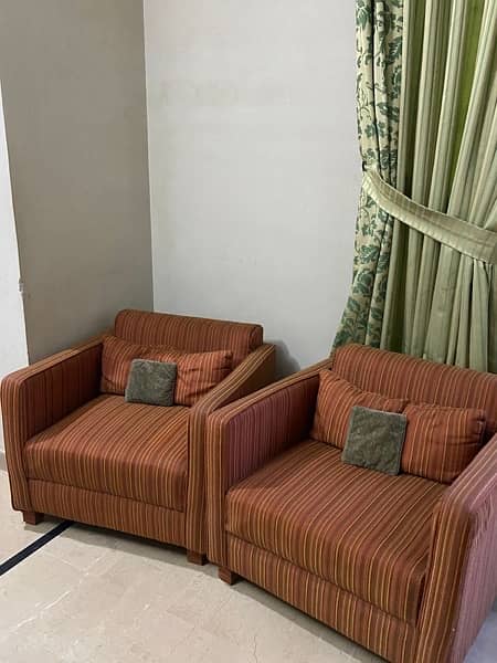 Four Single Seater Sofas 0