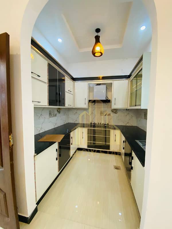 Classical 5 Marla double story designer house for sale on major road on very prime location 12