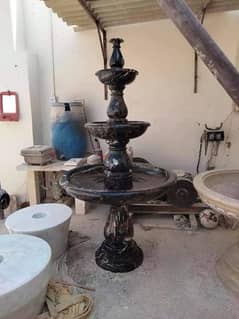 black and gold marbel fountain