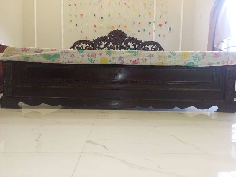 vintage style bed with beautifully designed head bored 1