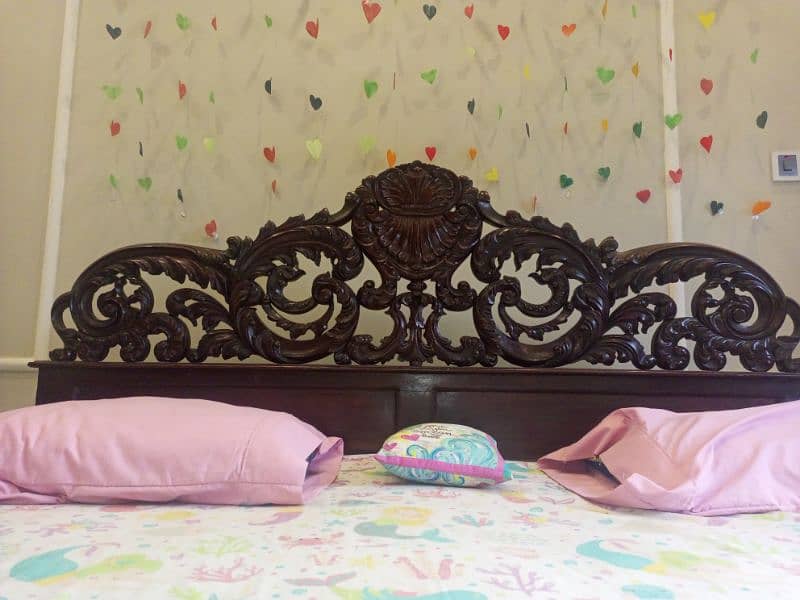 vintage style bed with beautifully designed head bored 2