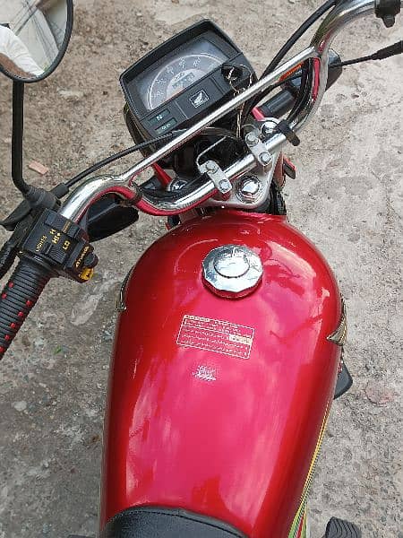 Honda cd 70 red color 2022 model urgent sell with original documents 6