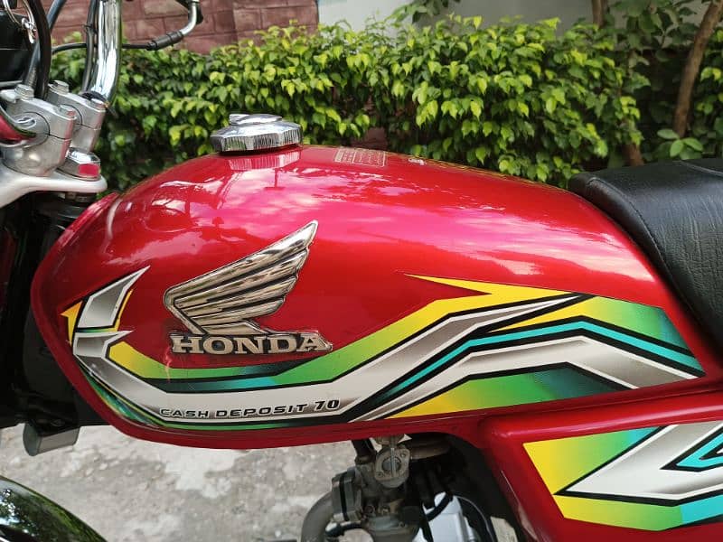 Honda cd 70 red color 2022 model urgent sell with original documents 10