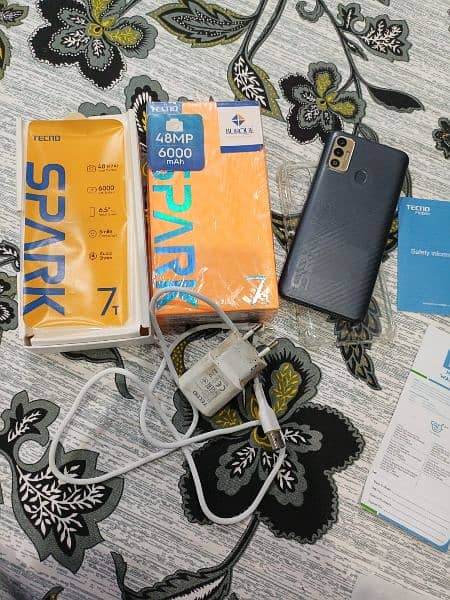 Tecno spark 7t  4/64 with box charger urgent sale 0