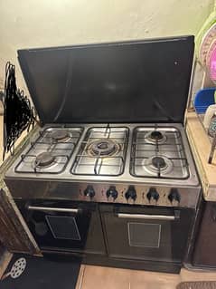 urgent sale 5 burners stove with cabinet  very good condition