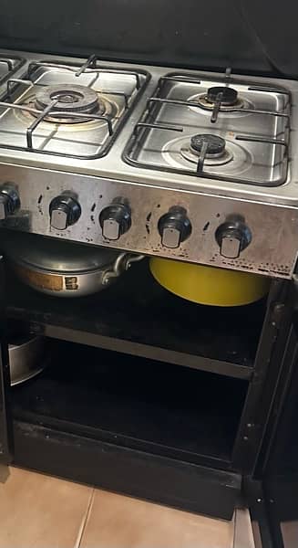 urgent sale 5 burners stove with cabinet  very good condition 1