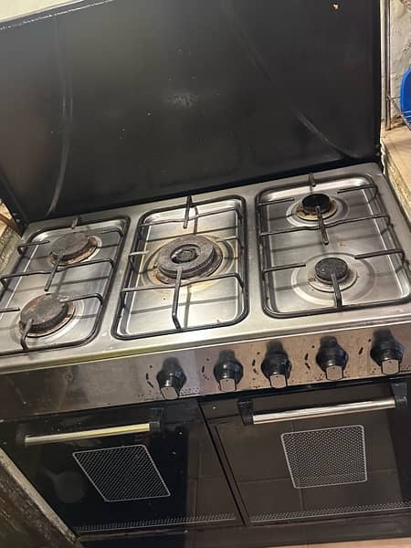 urgent sale 5 burners stove with cabinet  very good condition 2