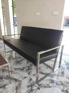 Five seater stainless steel sofa with table