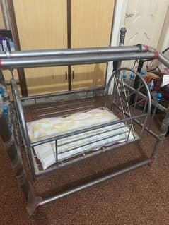 baby cradle swing with good condition in reasonable price range .