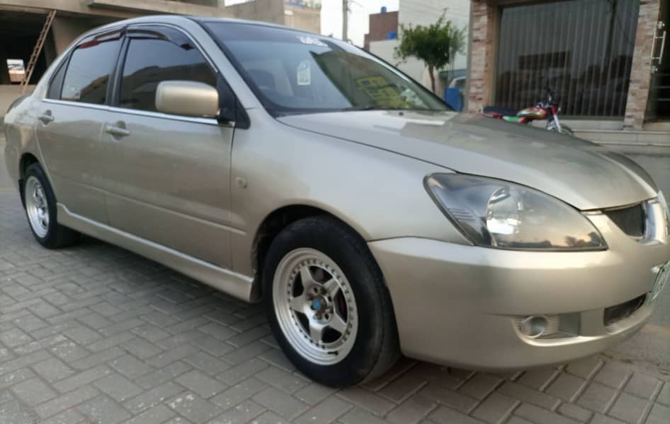 HOME USE LANCER GLX 1300CC(japani)VERY NEAT&CLEAN LIKE NEW 03009659991 4