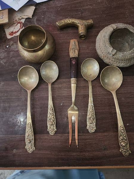 brass cocktail fork ,walking stick ,spoons ,brass vase, ashtray 10