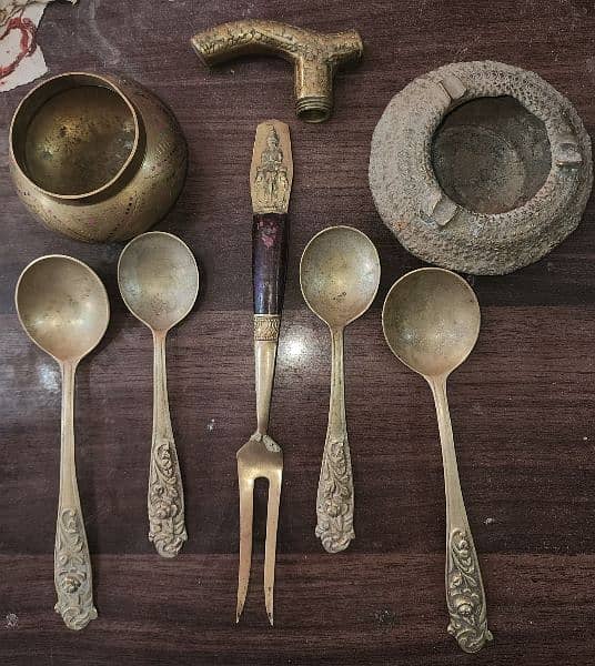 brass cocktail fork ,walking stick ,spoons ,brass vase, ashtray 12