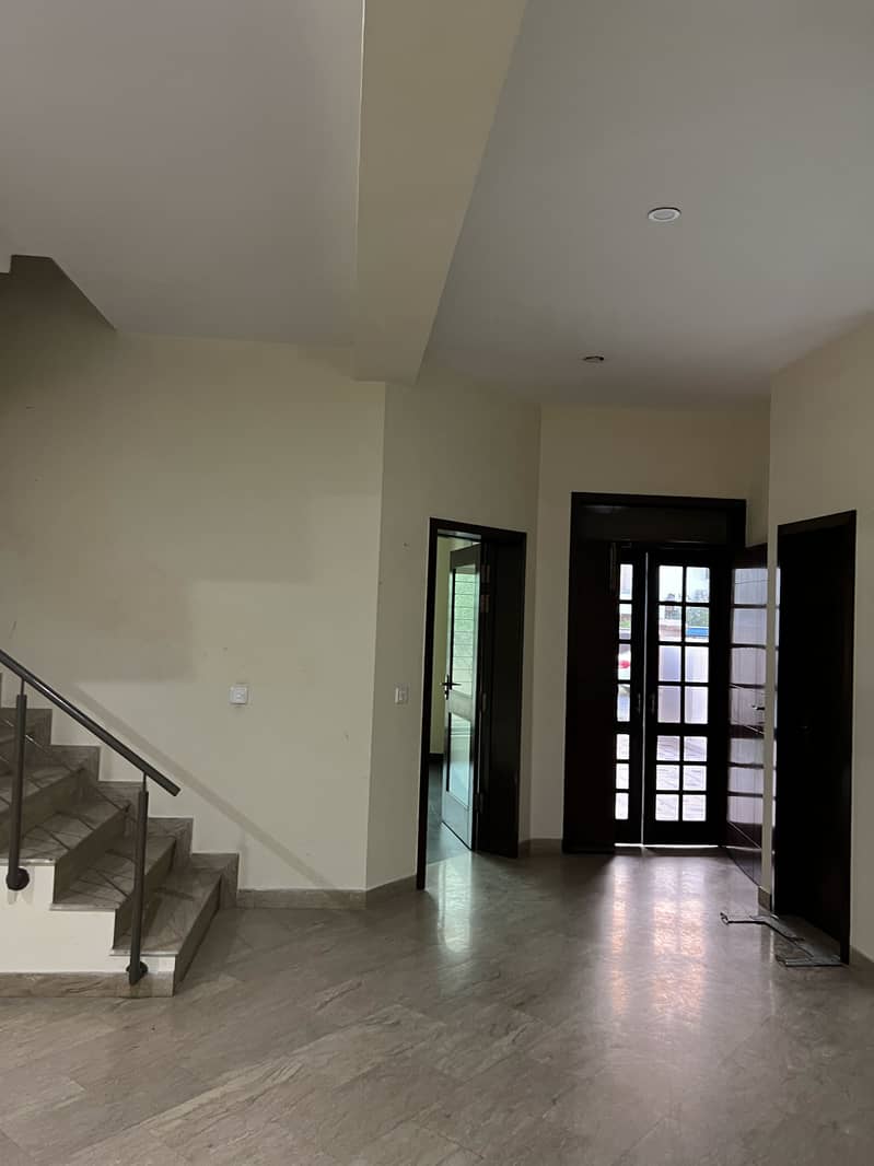 This spacious 10 Marla house in Fazaia Housing Scheme 9