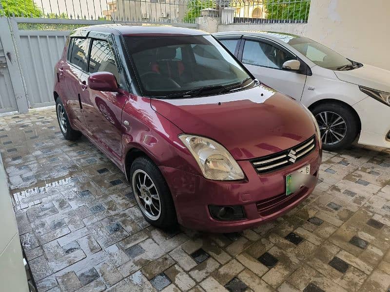 Suzuki Swift 2013 dlx1.3 first owner 17