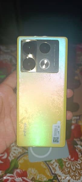 Infinix note 40 pro 12+12/256 colour gold with 10.5 month wornty 4