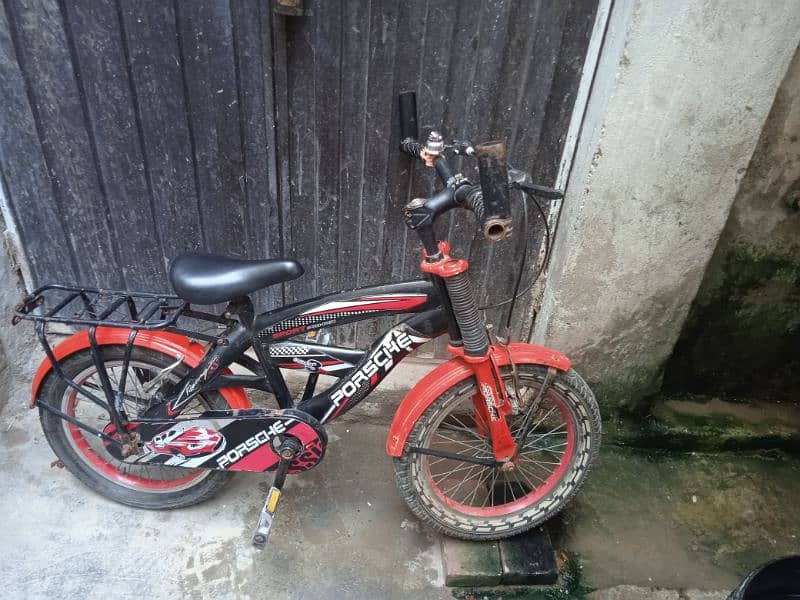 RED & BLACK BICYCLE FOR SALE . . . USE age 7 to 10 year child 2