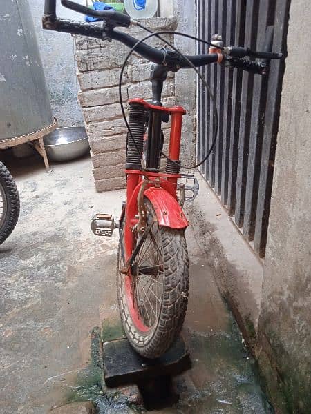 RED & BLACK BICYCLE FOR SALE . . . USE age 7 to 10 year child 3