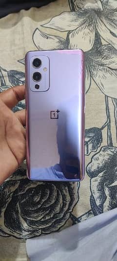 one plus 9 original pta back pr nishan hai bus