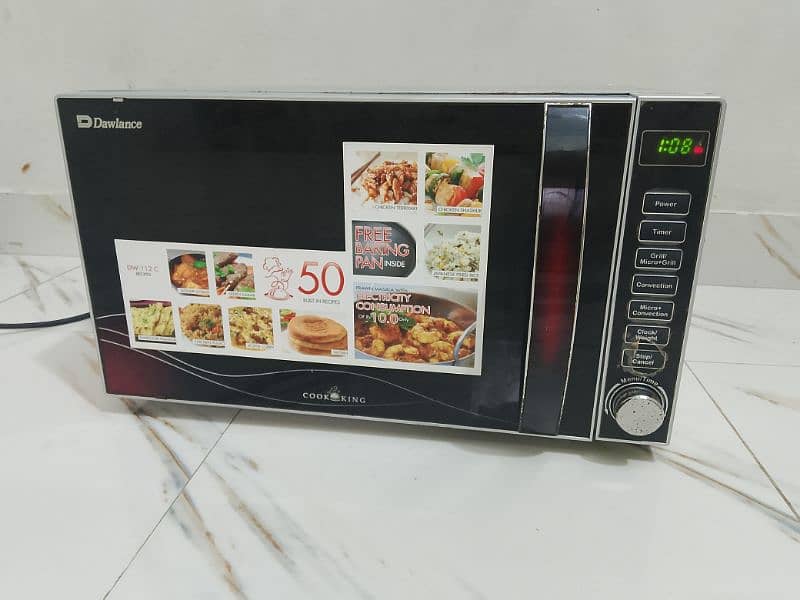 Dawlance microwave oven 3 in 1 grill baking microwave h vip condition 0