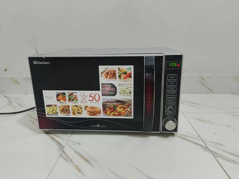 Dawlance microwave oven 3 in 1 grill baking microwave h vip condition 1