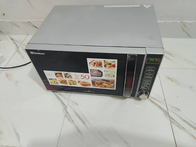 Dawlance microwave oven 3 in 1 grill baking microwave h vip condition 3