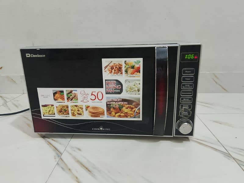 Dawlance microwave oven 3 in 1 grill baking microwave h vip condition 8