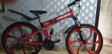 LAND. ROVER. FOLDING Gare cycle. new condition. 26 size