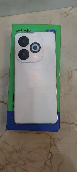 infinix smart 8 pro.  8/128 in new condition 9