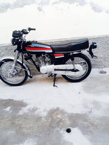 Honda 125 cc complete file 2003 model Lahore number 1