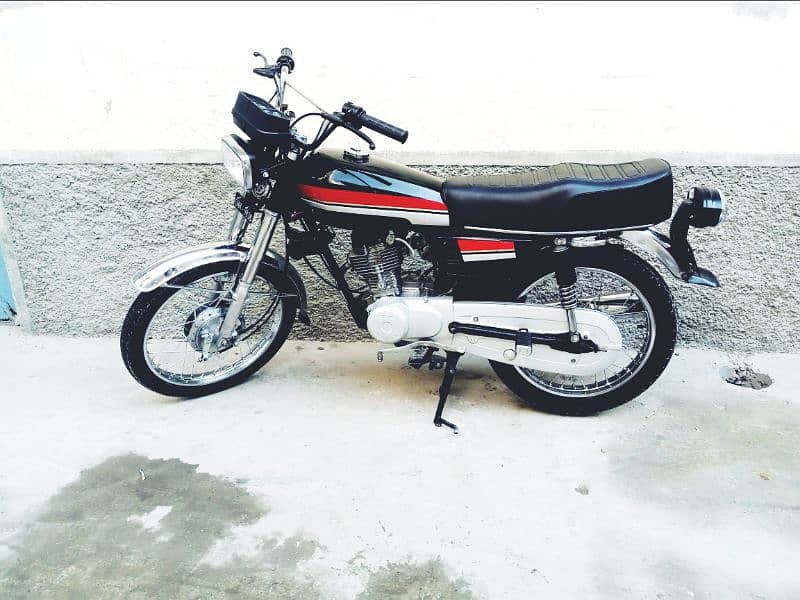 Honda 125 cc complete file 2003 model Lahore number 1