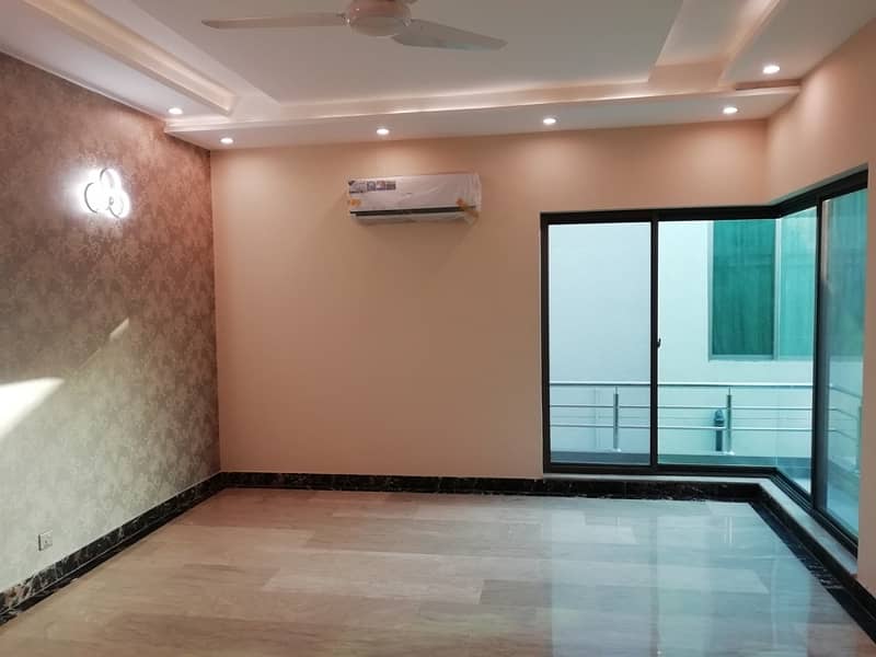 1 Kanal Nice Beautiful House Is Available For Sale In DHA Phase 1 Lahore. 24