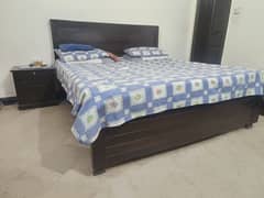 double bed with two side tables