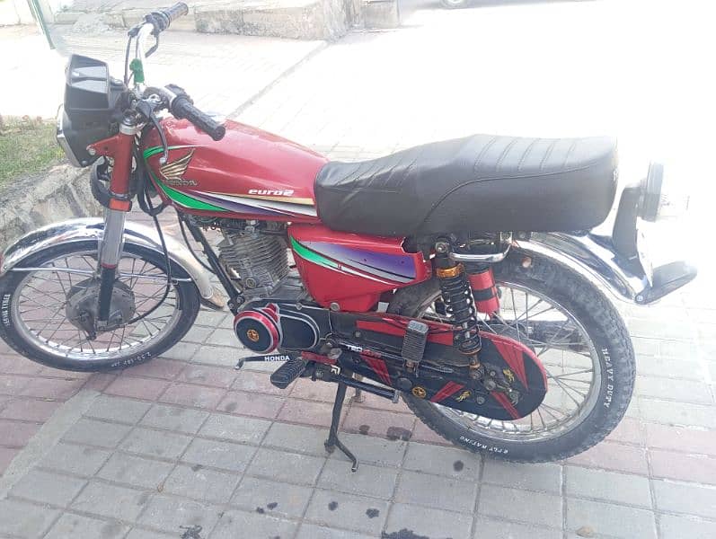 honda 125 13 model ha Rawalpindi Ka number laga hoya ha 0