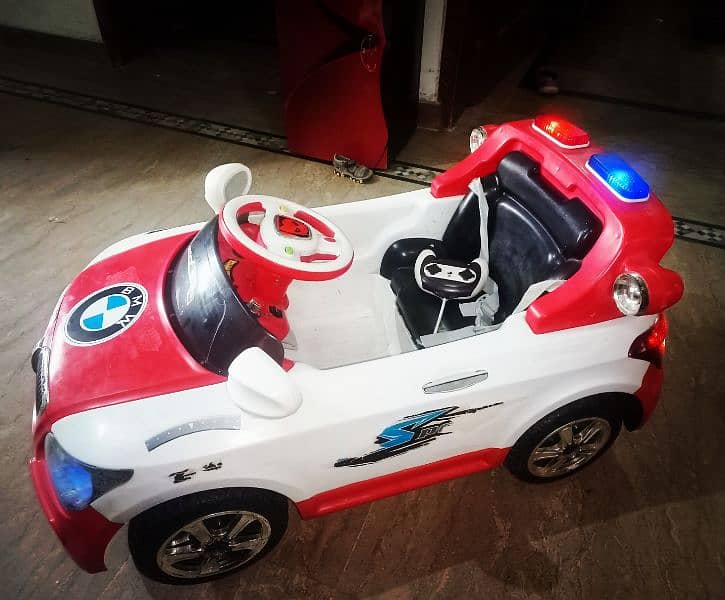 kids battery operated car dual function self operated +remote opreated 4