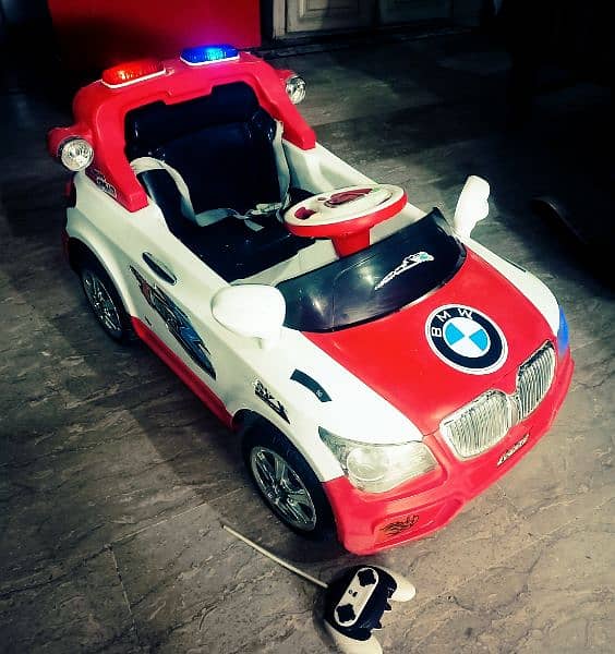 kids battery operated car dual function self operated +remote opreated 7