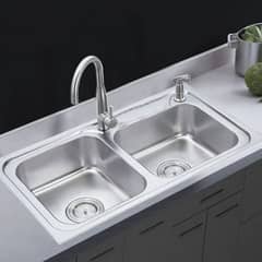 Double bowl used sink with wastge pipe