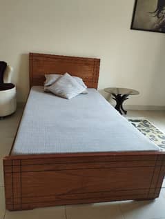 single wooden bed