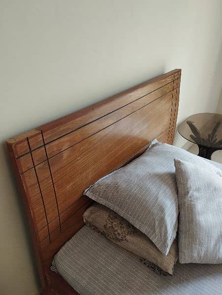 single wooden bed 1