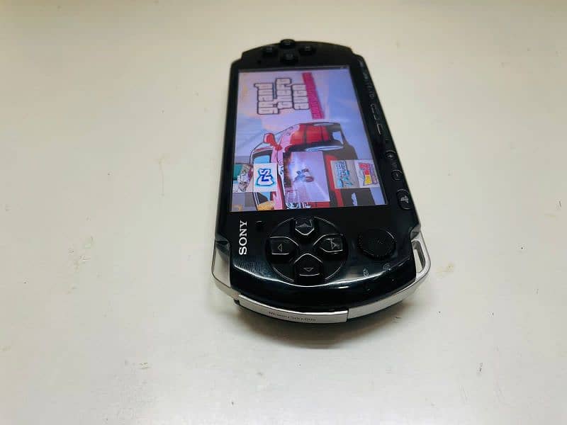 PSP 3000 8/10 condition with free case and 45 + games 5