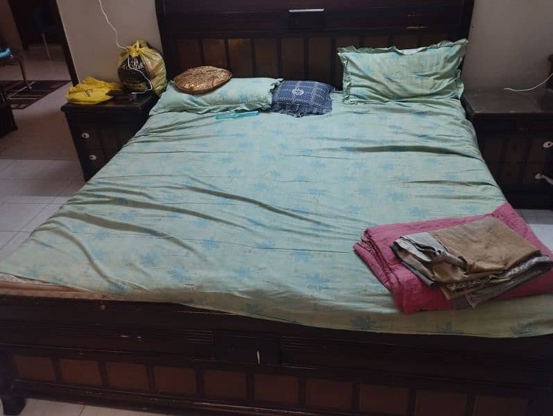 Complete wooden bed set available in good condition 0