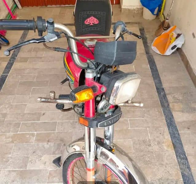 united 20 modal 70 cc red open letar 2