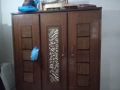 wooden 3 door cupboard 3 door glass divider and a dressing