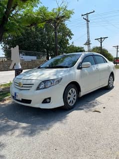 Toyota Corolla 2009 xli convert Gli islamabad number 03339563308