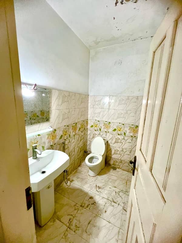 2 BEDROOM FIRST FLOOR FLAT FOR SALE F-17 ISLAMABAD 4