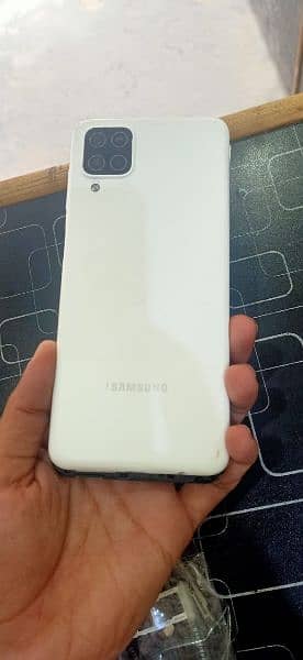 Samsung a12 Infinitx smart 7 1