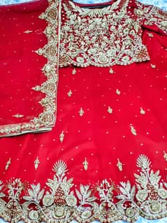 Discounted Designer Bridal Lehnga in Deep Red Color