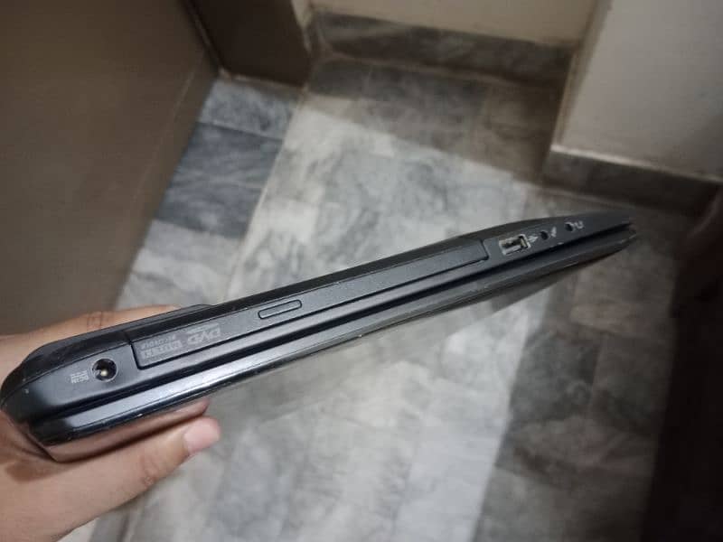 ASUS Q500A Laptop (i5 3rd Gen, 4GB RAM, 320GB HDD) 3