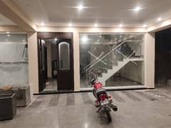 1 KANAL GROUND & FIRST FLOOR FOR RENT ON MAIN ROAD OPP UCP 0