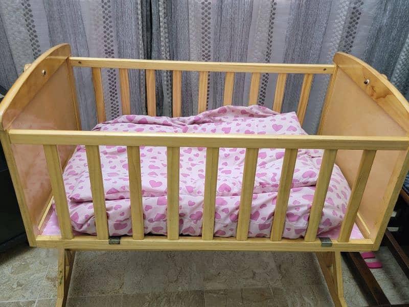 wooden baby cot with free mattress n mattress covers 3